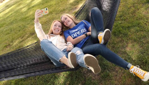 photo of students in hommock taking selfie