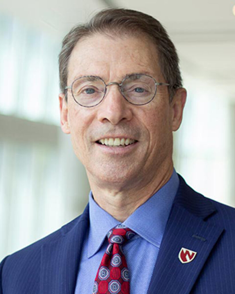 Josh Portillo, UNMC Dean Kyle Meyer speaking Friday at UNK winter