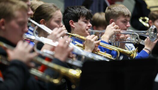 Nebraska high schoolers play musical instruments at a concert at UNK.