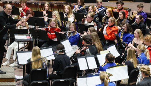 Nebraska high schoolers play musical instruments at a concert at UNK.