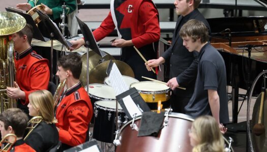 Nebraska high schoolers play musical instruments at a concert at UNK.