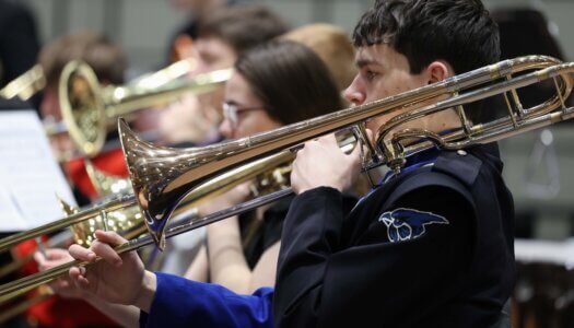 Nebraska high schoolers play musical instruments at a concert at UNK.