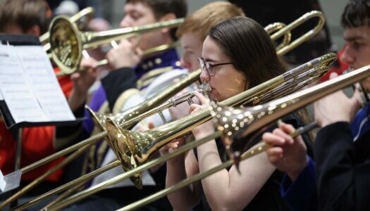 Nebraska high schoolers play musical instruments at a concert at UNK.