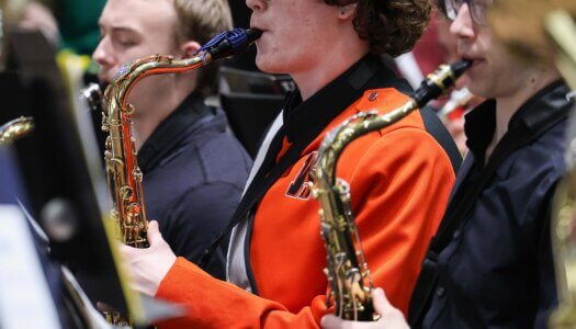 Nebraska high schoolers play musical instruments at a concert at UNK.