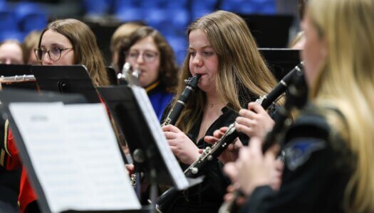 Nebraska high schoolers play musical instruments at a concert at UNK.