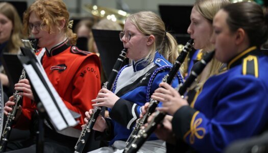 Nebraska high schoolers play musical instruments at a concert at UNK.