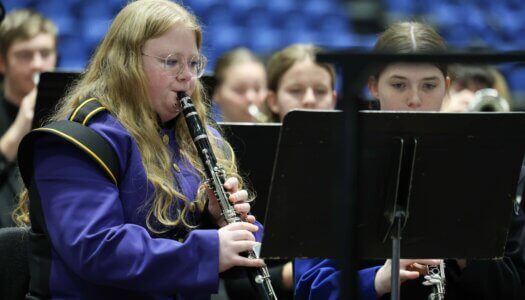 Nebraska high schoolers play musical instruments at a concert at UNK.