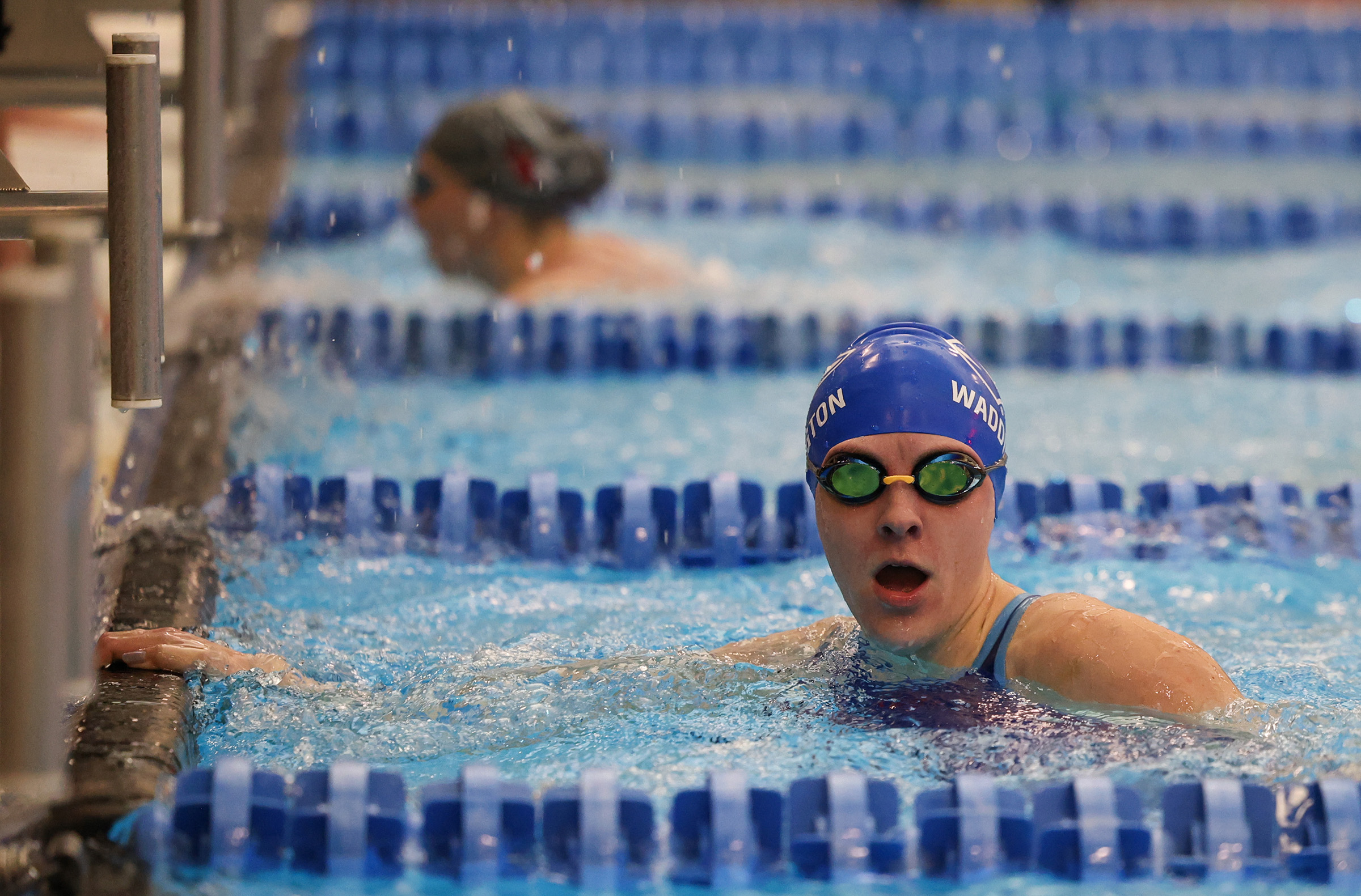 Maggie Waddington looks toward the camera after finishing a race.