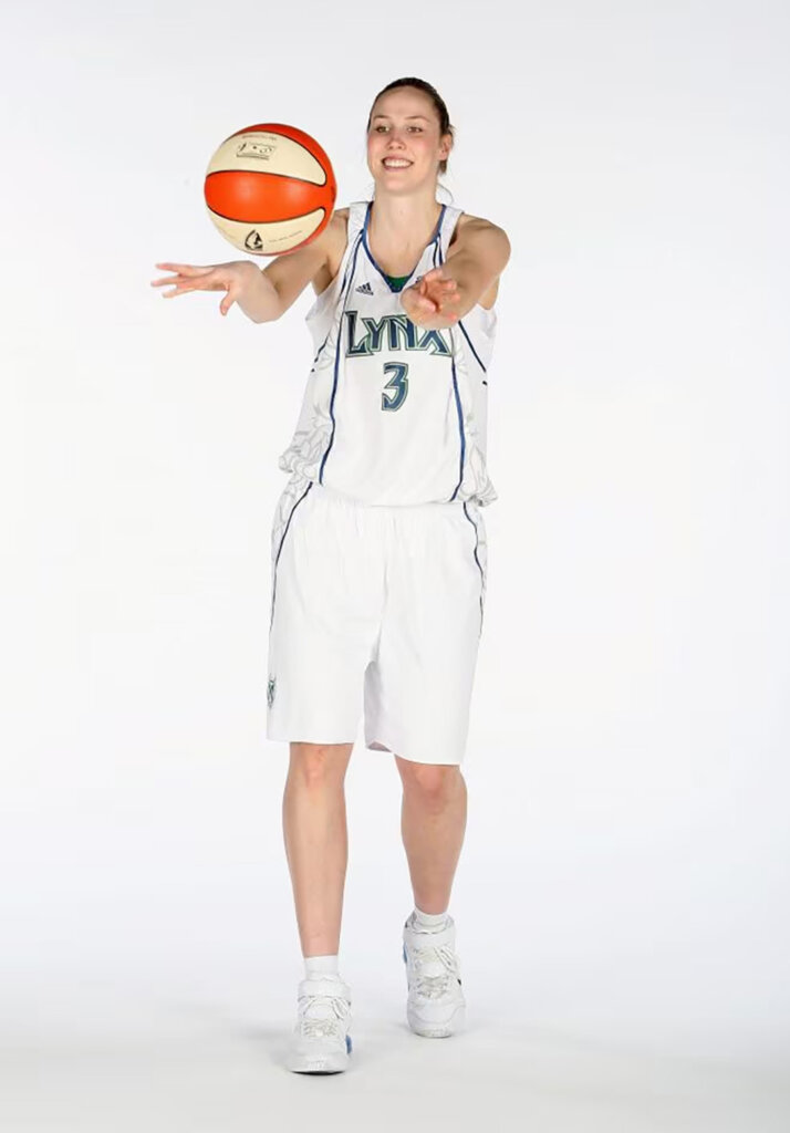 Nicole (Ohlde) Johnson is pictured in a team promo photo wearing her Minnesota Lynx jersey.