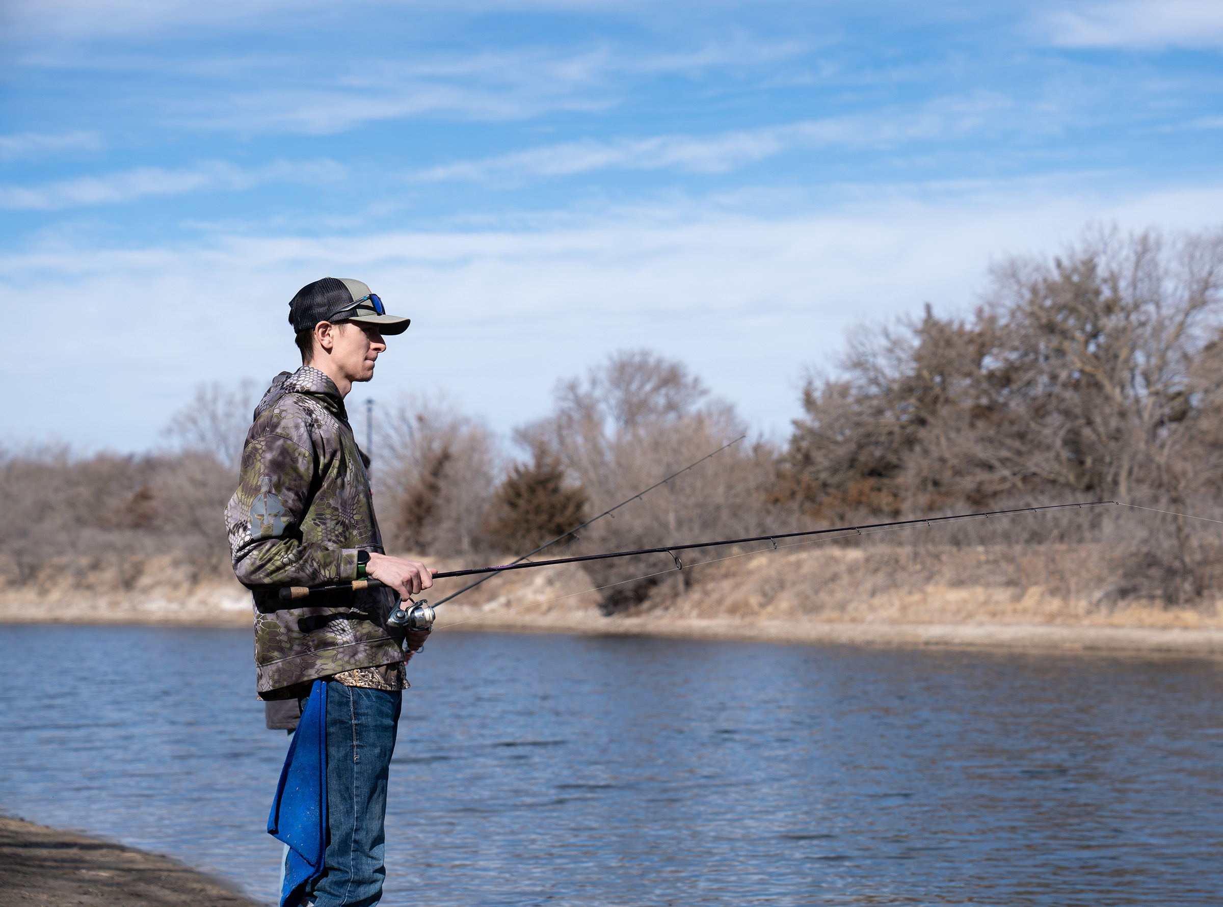 Robert Allison fishes at Archway Lake in Kearney.