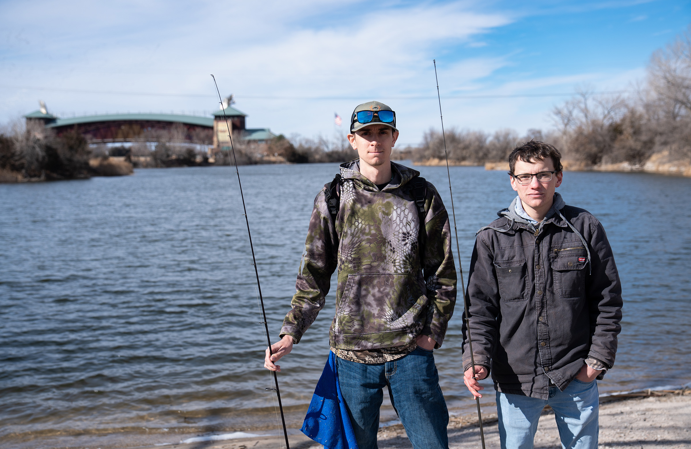 Robert Allison and Connor Banzhaf pose for a photo at Archway Lake in Kearney.