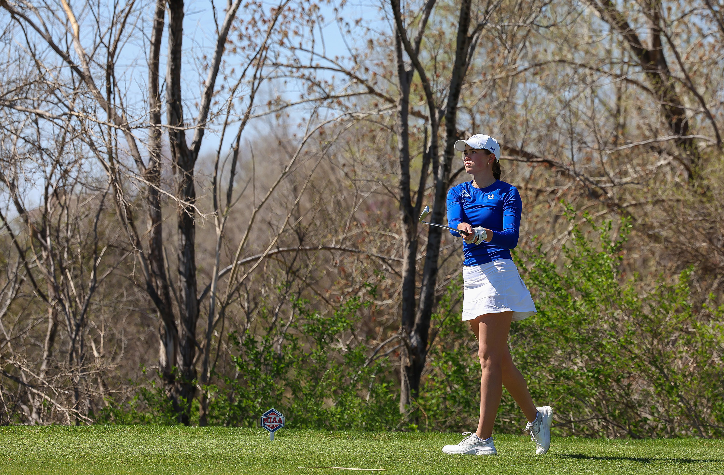 Calie Dockter hits a tee shot during the MIAA Championships at Meadowlark Hills Golf Course.