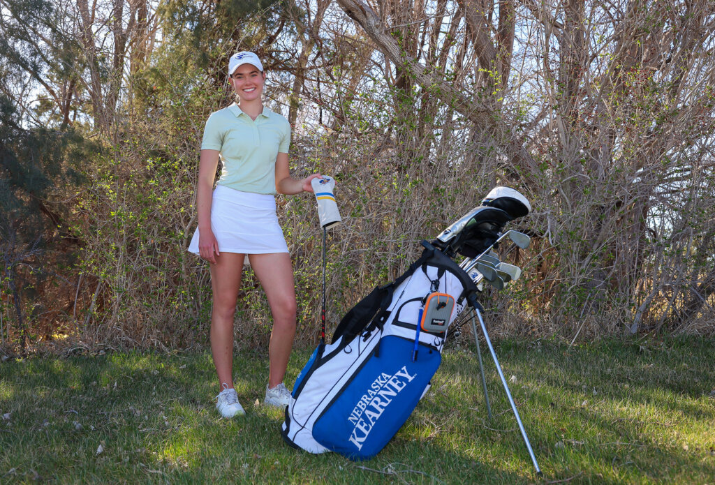 Calie Dockter poses for a photo at Meadowlark Hills Golf Course in Kearney.