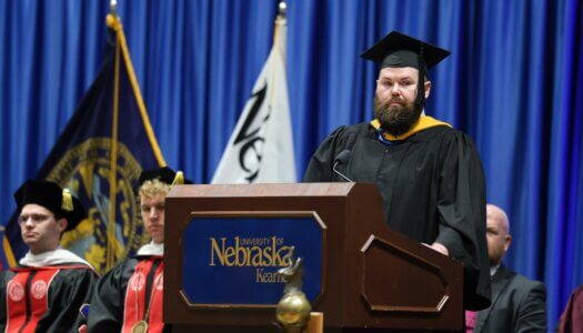 UNK Staff Senate President Tyler Pierce-Panowicz speaks during the investiture.