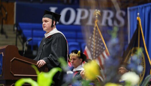 Brian Hastings speaks during the investiture.
