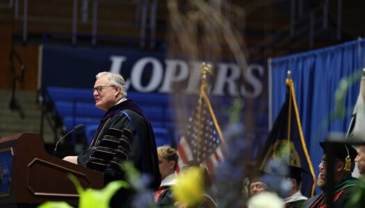 Former UNK Chancellor Doug Kristensen speaks during the investiture.