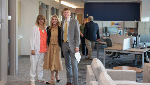 A UNK Chancellor's Ambassador is pictured during the Regional Engagement Center ribbon-cutting ceremony.