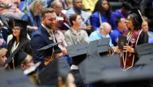 Chancellor's Ambassador Luke Przymus is pictured during a UNK commencement ceremony.