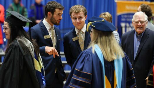 Chancellor's Ambassadors work during the investiture.