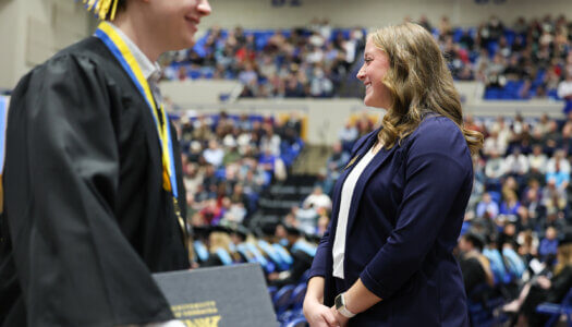 Former Chancellor's Ambassador Daylee Dey is pictured during a UNK commencement ceremony.