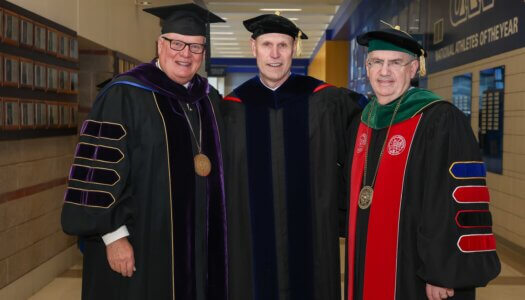 Former UNK Chancellor Doug Kristensen, current Chancellor Neal Schnoor and NU System President Jeffrey Gold pose for a photo.
