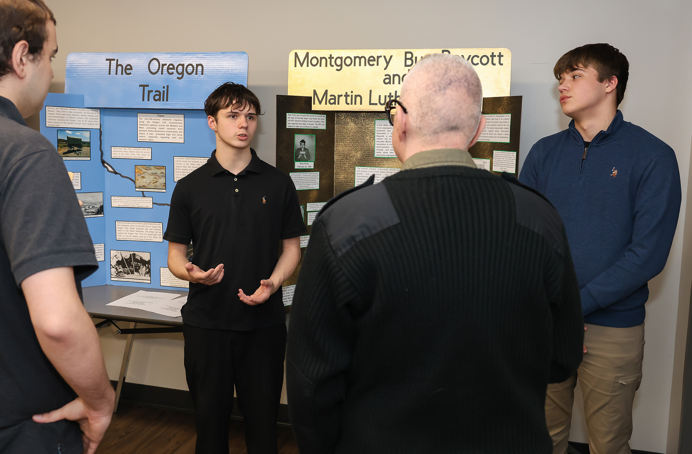 Students present their exhibit to the judges Wednesday during the Nebraska National History Day district competition at UNK.