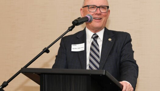 Speaker of the Legislature John Arch addresses the audience during "I Love NU" Day.