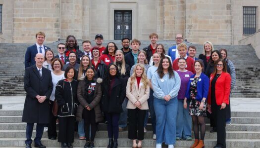 NU supporters pose for a photo outside the State Capitol.