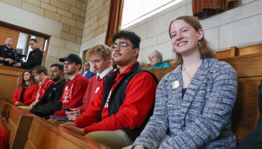 UNK student Paige Oltmans is pictured in the balcony at the State Capitol.