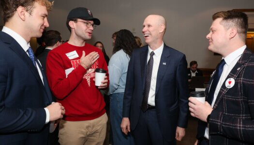 UNK Student Regent Sam Schroeder, UNMC Student Regent Brock Calamari, UNK Chancellor Neal Schnoor and UNO Student Regent Drew Leisy chat during "I Love NU" Day.