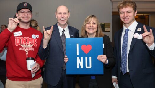 UNMC Student Regent Brock Calamari, UNK Chancellor Neal Schnoor, UNK Senior Vice Chancellor Julie Shaffer and UNK Student Sam Schroeder pose for a photo during "I Love NU" Day.