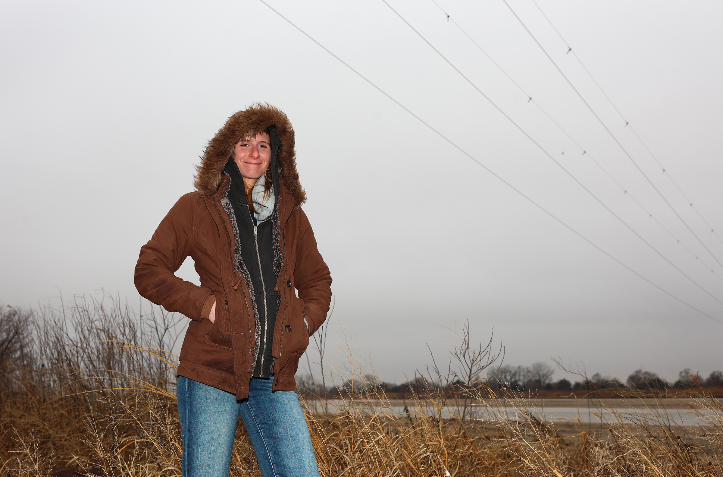 Katie Arens poses for a photo along the Platte River.