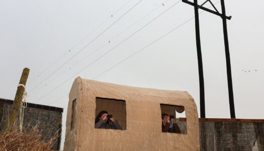 Amanda Hegg and Katie Arens are pictured in an observation blind along the Platte River.