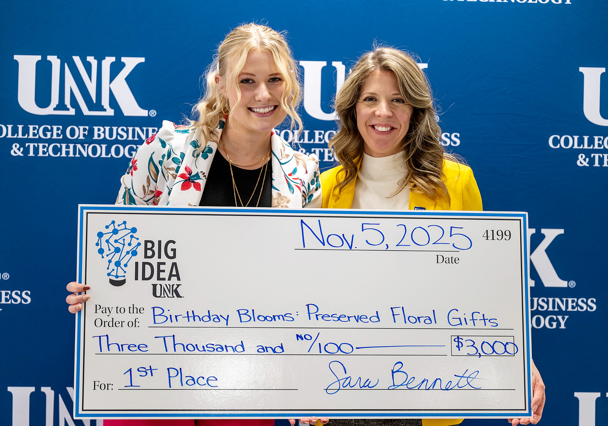 UNK senior Fallon Wells is pictured with Center for Entrepreneurship and Rural Development Director Sara Bennett after winning the Big Idea business pitch competition in November.