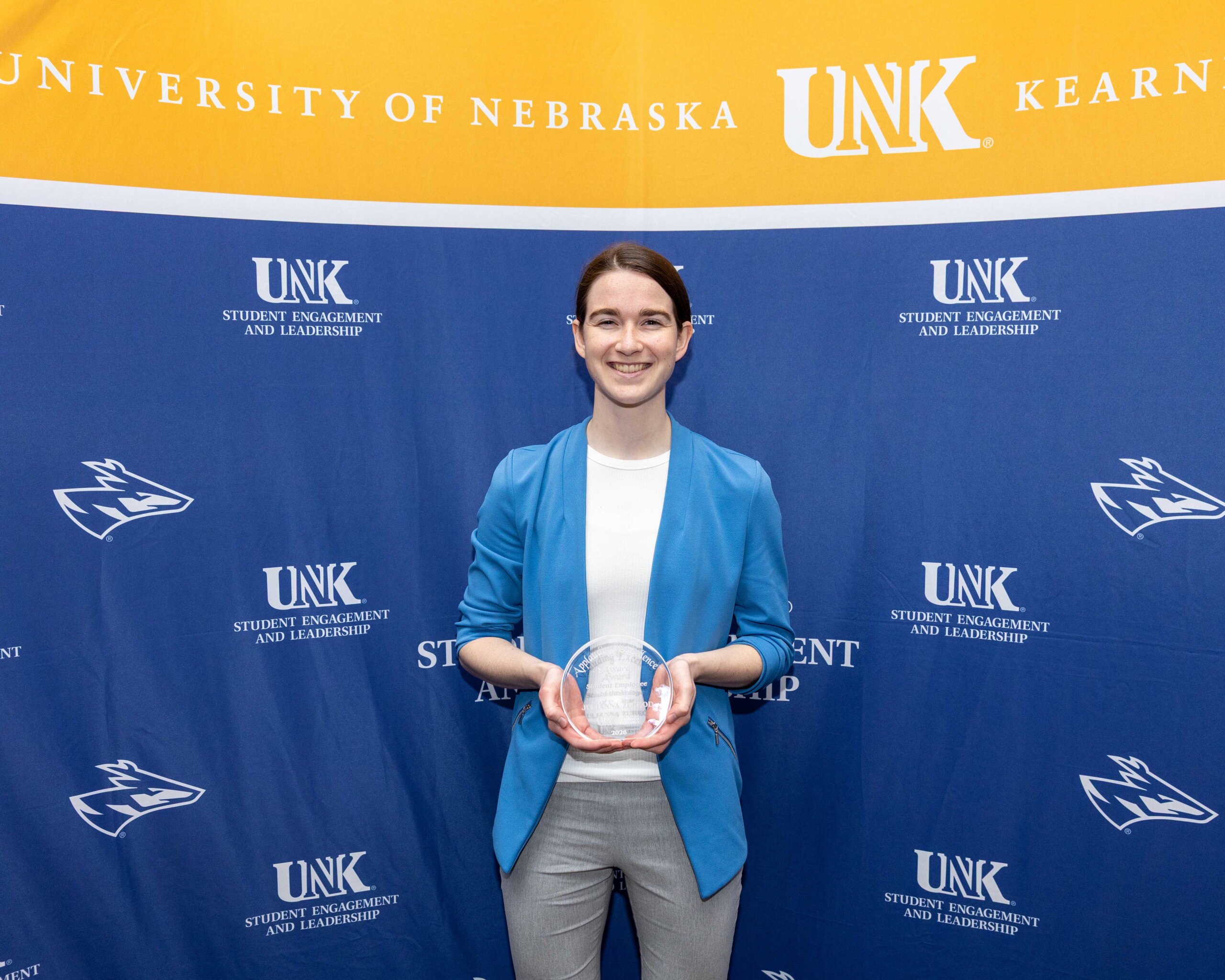Julianna Zubrod accepts the student employee of the year award.
