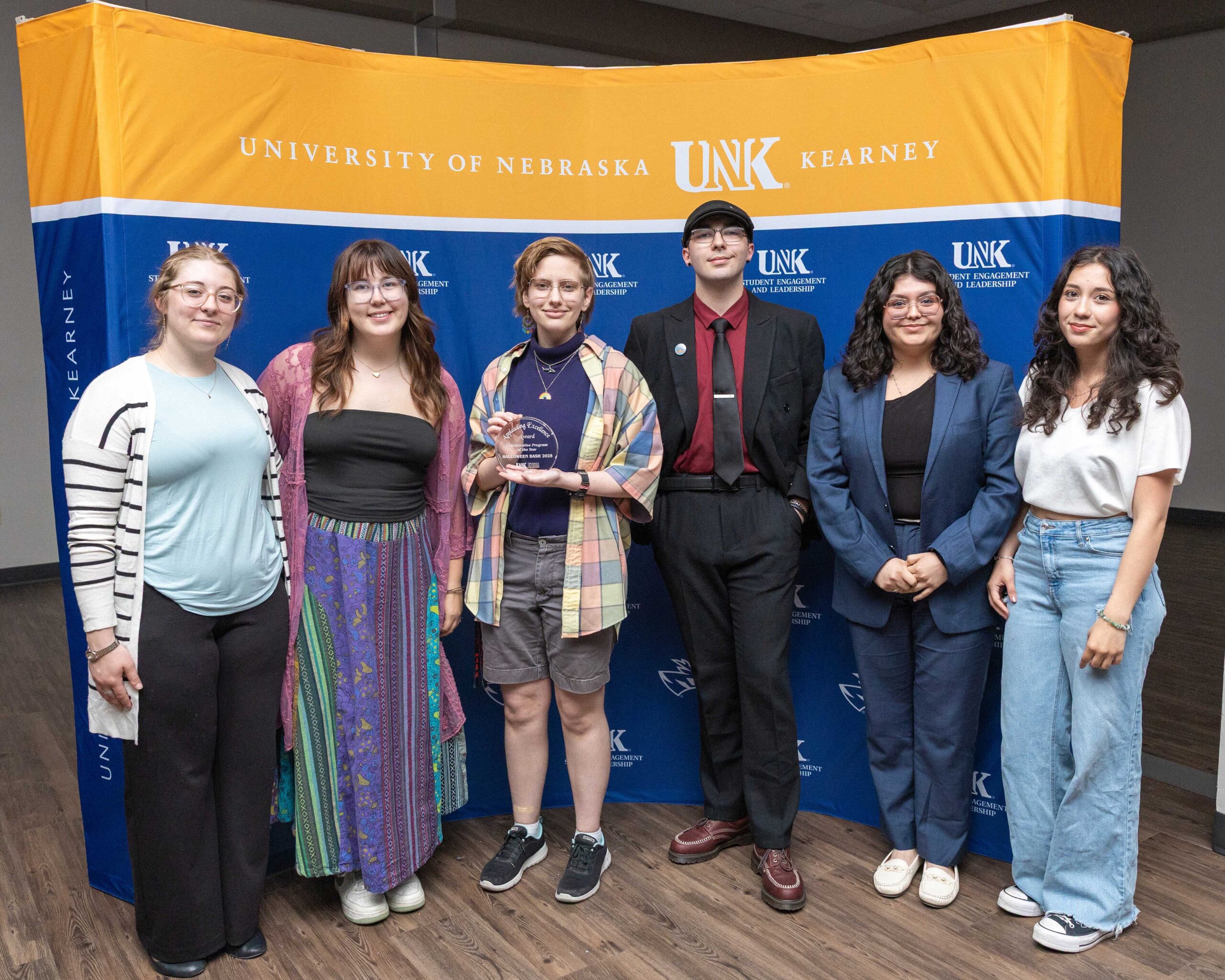 UNK students accept the collaborative program award.