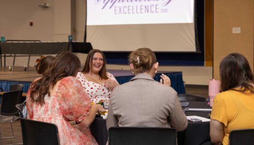 UNK students attend the Applauding Excellence awards ceremony.