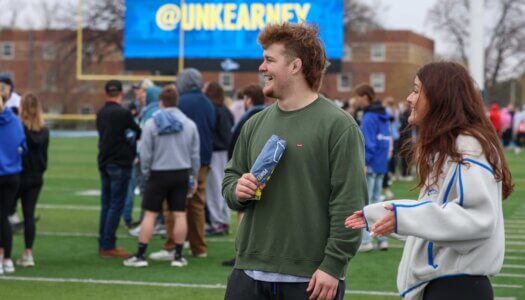 UNK students wait for The Big Event to begin at Cope Stadium.