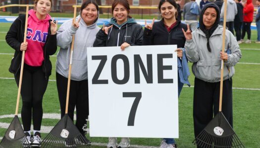 UNK students pose for a photo at Cope Stadium.