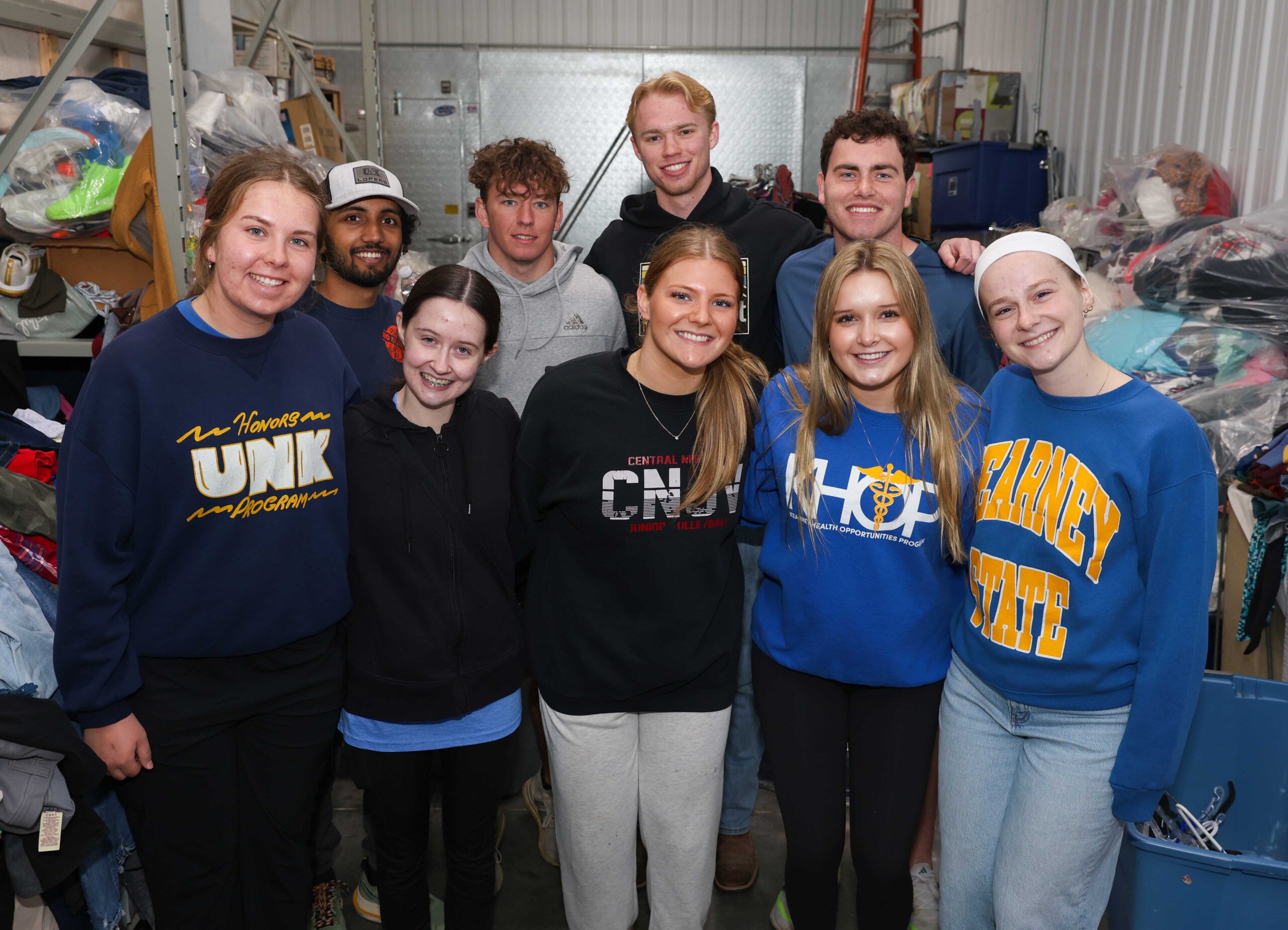 Members of the Kearney Health Opportunities Program are pictured at Crossroads Mission Avenue in Kearney, where they volunteered Saturday during The Big Event.