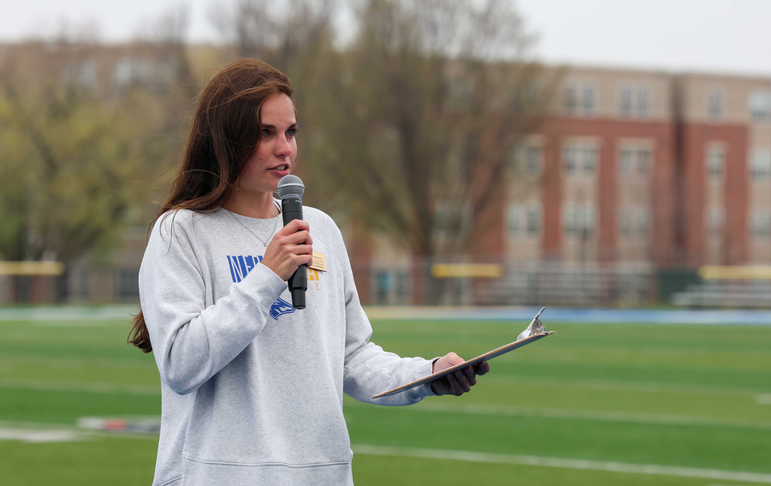 UNK junior Carly Gaedeke speaks Saturday during The Big Event kickoff at Cope Stadium.