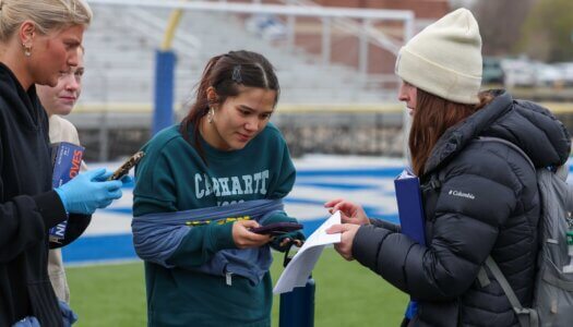 UNK students prepare for The Big Event at Cope Stadium.