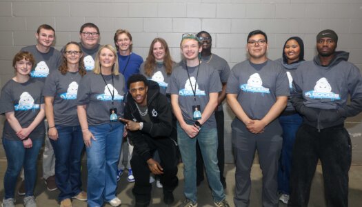 A Boogie Wit da Hoodie poses for a photo with LPAC members.
