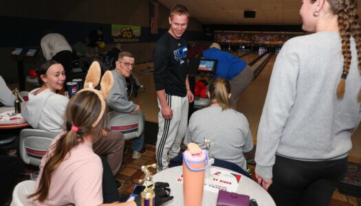 UNK junior Derek Pfeifer volunteers at Buddy Bowling.