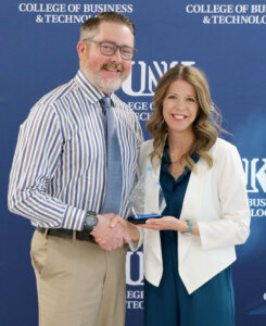 Caleb Pollard receives the Entrepreneurship Advocate Award.