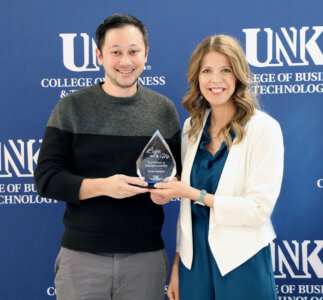 Cody Lawson receives the Excellence in Entrepreneurship Award.
