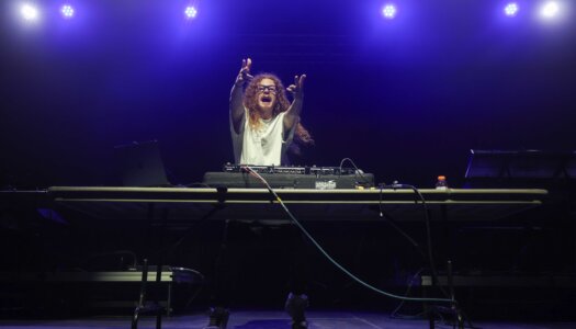 DJ Redlocks performs during the UNK spring concert.