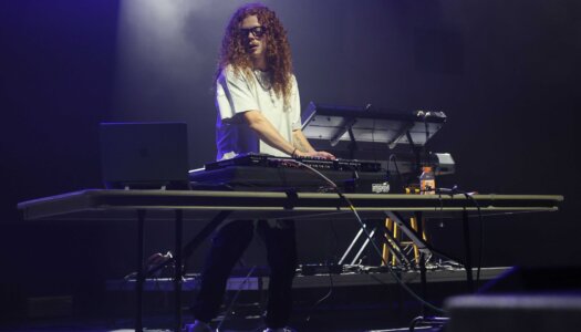 DJ Redlocks performs during the UNK spring concert.