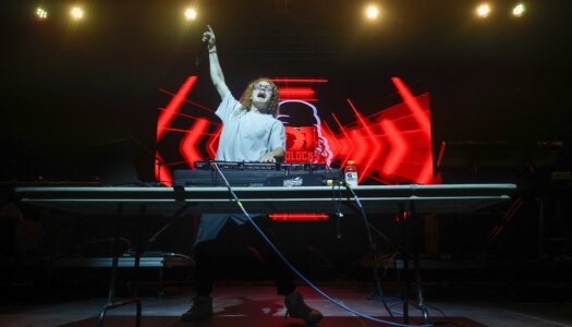 DJ Redlocks performs during the UNK spring concert.