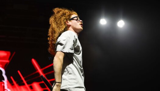 DJ Redlocks performs during the UNK spring concert.